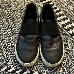 Vince black leather slip on sneakers